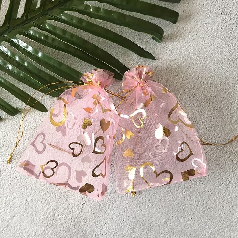 Сумочка 12 х 9,5 см, сітчаста рожева з золотими та срібними серцями, нейлон